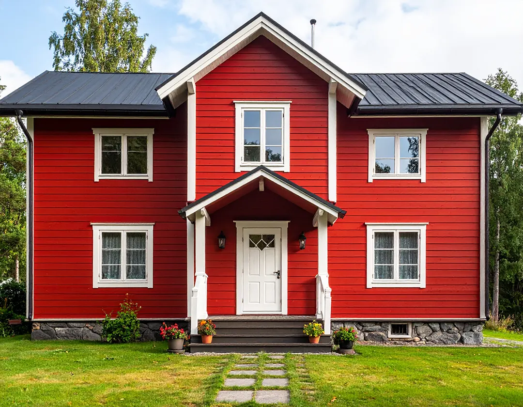 Punainen kaksikerroksinen talo